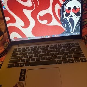 1Lenovo Silver Laptop 1i